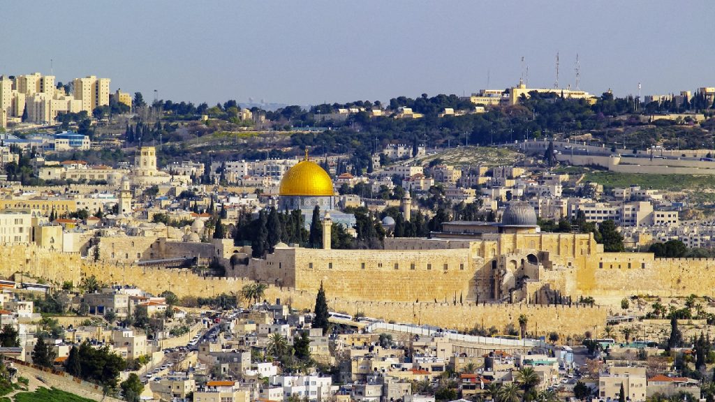 Panoramic view of the Old City of Jerusalem, showing the golden Dome of the Rock and the surrounding stone walls