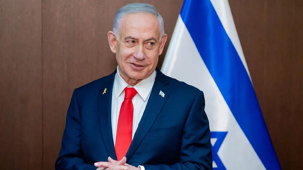 Netanyahu and the Israeli flag