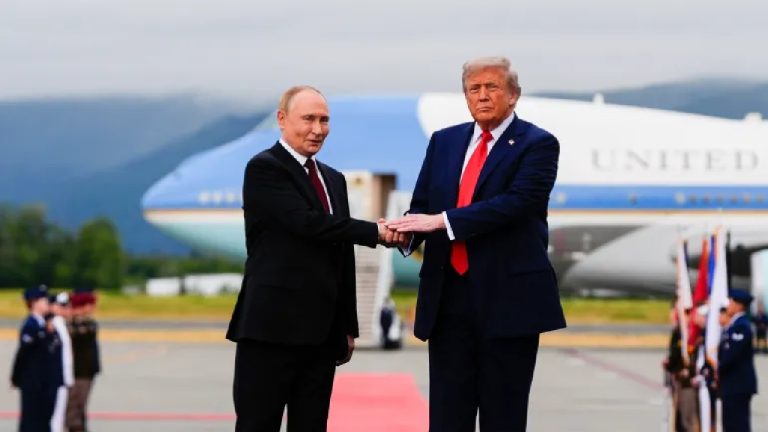 Donald Trump and Vladimir Putin shaking hands on an airport tarmac in front of Air Force One