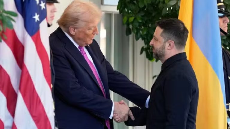 Donald Trump shaking hands with Volodymyr Zelenskyy in front of U.S. and Ukrainian flags
