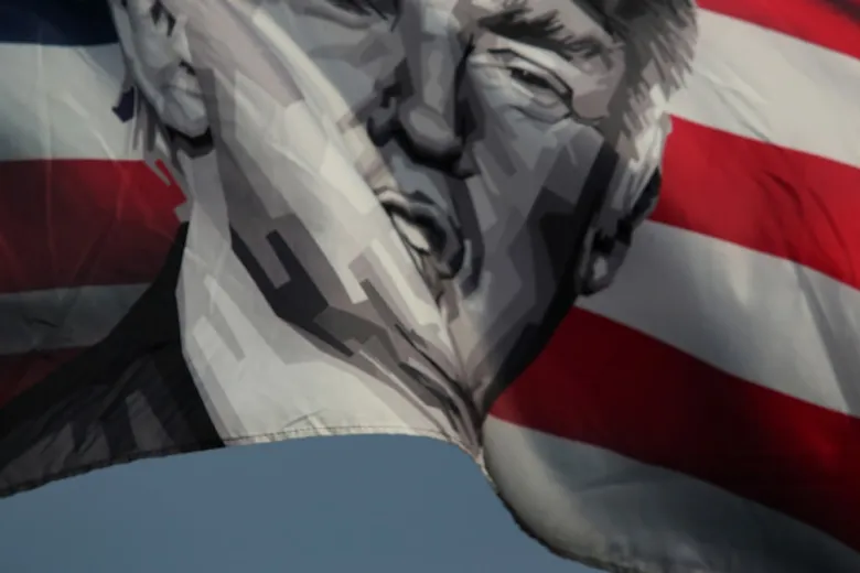Stylized graphic of Donald Trump's face superimposed on a waving American flag.
