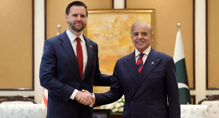 JD Vance shaking hands with Shehbaz Sharif during an official diplomatic meeting.