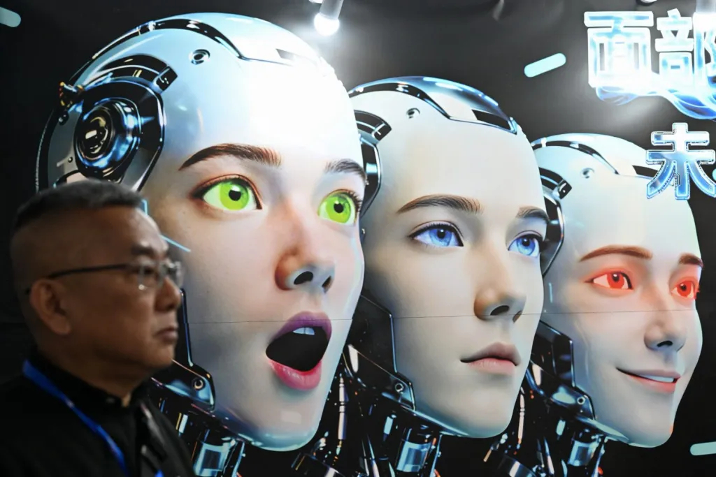 Three humanoid robot faces with expressive eyes on a large display.