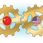 Two gold interlocking gears featuring the national flags of China and the United States.