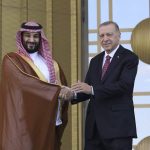 President Erdogan of Turkey shaking hands with Crown Prince Mohammed bin Salman.