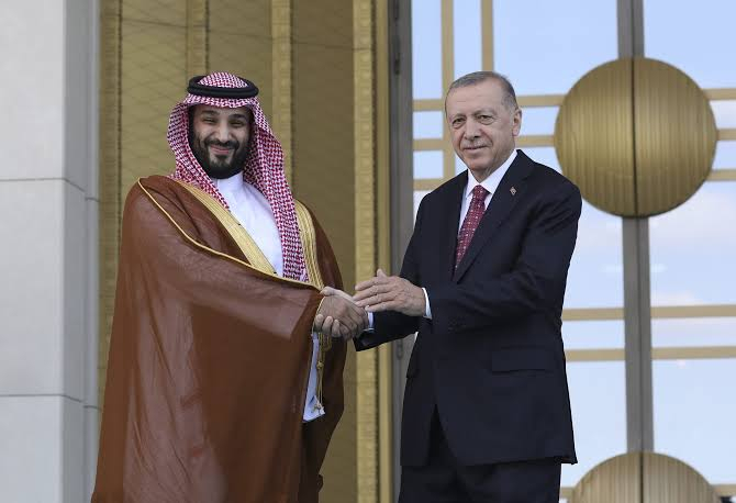 President Erdogan of Turkey shaking hands with Crown Prince Mohammed bin Salman.