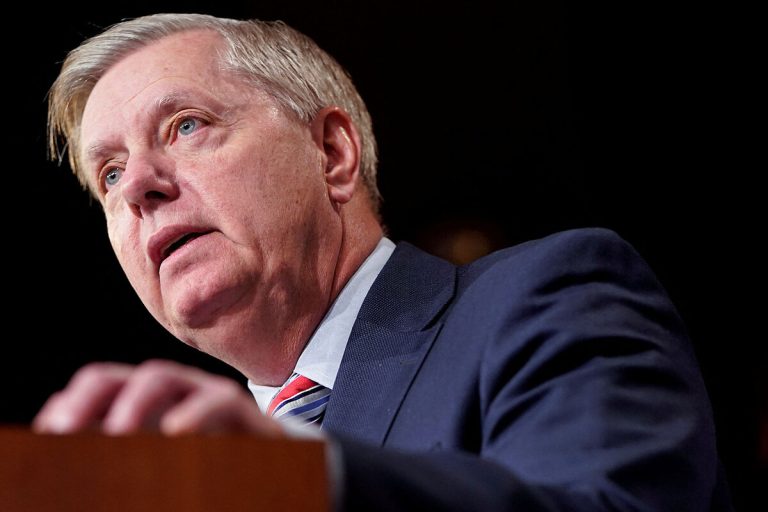 Senator Lindsey Graham speaking at a podium, symbolizing a shift in US foreign policy.