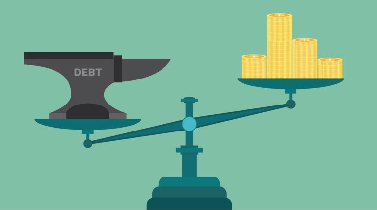 Balance scale comparing a heavy black anvil labeled DEBT against stacks of golden coins.