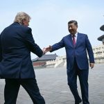 Donald Trump shaking hands with Chinese President Xi Jinping in Beijing.