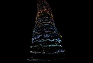 Abstract 3D rendering of multi-colored glowing ribbons spiraling upward on a black background.