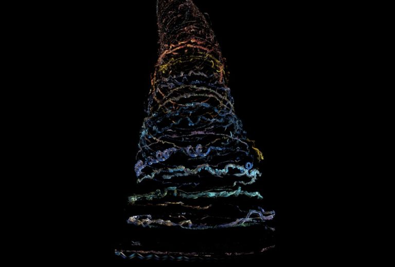 Abstract 3D rendering of multi-colored glowing ribbons spiraling upward on a black background.