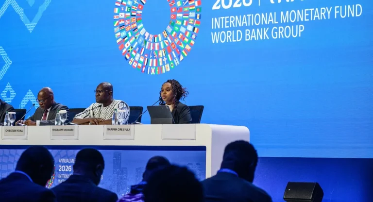 Speakers seated at a panel discussion during the International Monetary Fund and World Bank Group Annual Meetings.