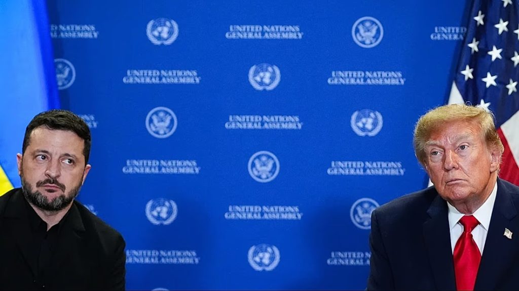 Ukrainian President Volodymyr Zelenskyy and Donald Trump seated in front of a blue United Nations backdrop.