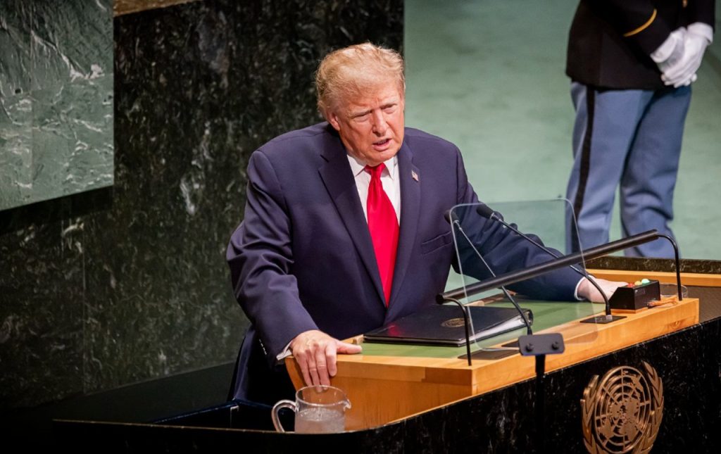 Donald Trump speaking at the United Nations General Assembly rostrum.